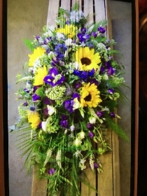 Casket spray blue and yellow